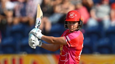 Welsh Fire batter Jess Jonassen plays a shot