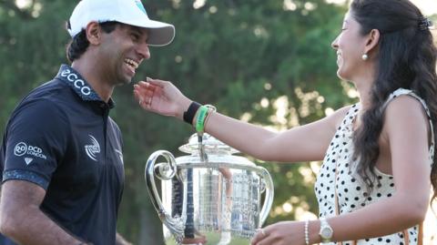 Aaron Rai is congratulated by his wife Gaurika Bishnoi after winning the US PGA Championship