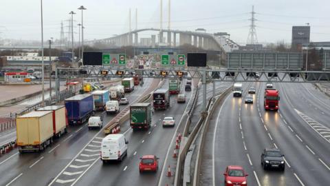 Lorries and cars driving on the Dartford Crossing which connects Essex to Kent