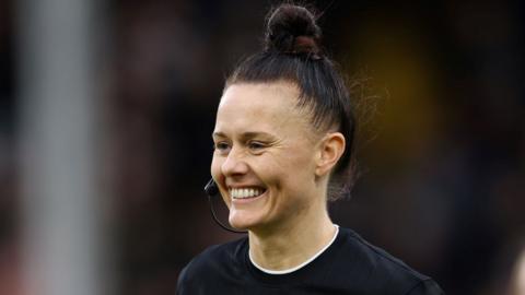 Rebecca Welch officiates a Premier League match