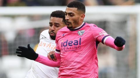 Karlan Grant (right) in action for West Brom against Swansea