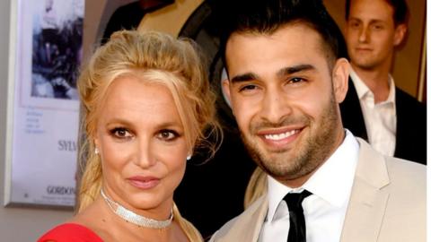 Britney Spears (L) and Sam Asghari arrive at the premiere of Sony Pictures' "One Upon A Time...In Hollywood" at the Chinese Theatre on July 22, 2019