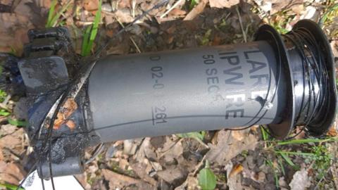 The bomb squad blew up the device on a nearby road