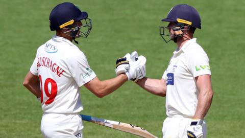 Glamorgan's Marnus Labuschagne and Chris Cooke celebrate