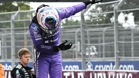 Kimi Antonelli bows in celebration after winning the Miami Grand Prix