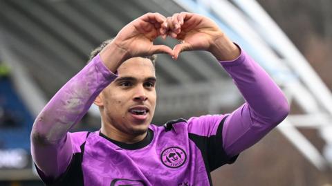Raphael Borges Rodrigues of Wigan Athletic celebrates after scoring against Huddersfield Town