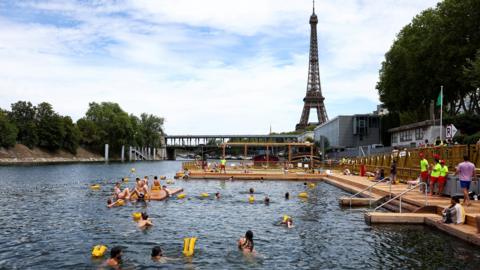 Swimmers in the river Seine.