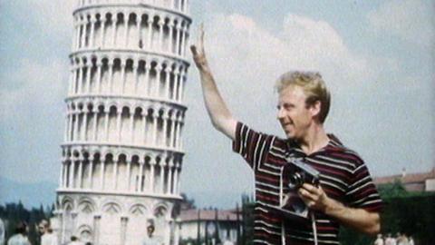 Prof John Burland poses beside the Leaning Tower of Pisa