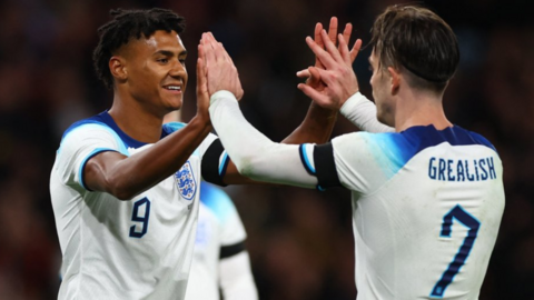 Ollie Watkins and Jack Grealish celebrate a goal for England