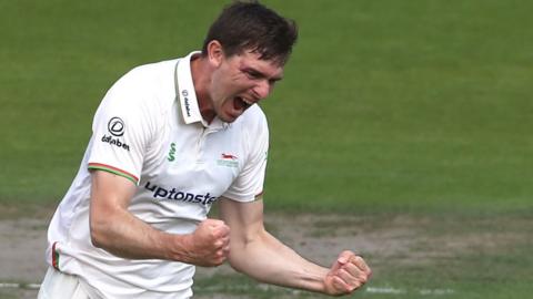 Leicestershire's Matt Salisbury celebrates a wicket