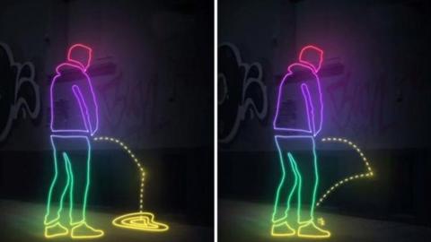 Animated image showing a man attempting to urinate, with the urine bouncing off the wall.