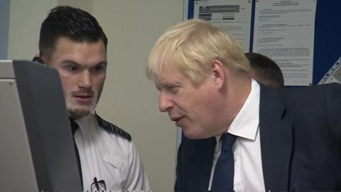 Boris Johnson looking at a body scan