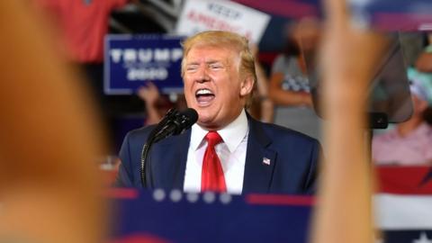 US President Donald Trump speaks at a "Make America Great Again" rally at Minges Coliseum in Greenville, North Carolina