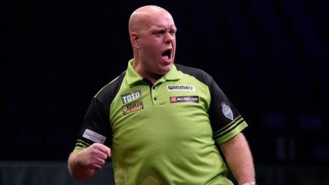 Michael van Gerwen celebrates on the oche