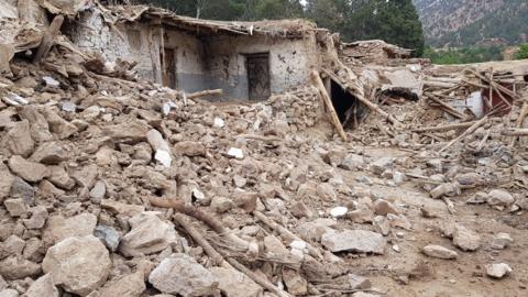 Damaged buildings in Spera district