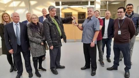 Leader of Basildon Council, Cllr Andrew Baggott (left) handing over the keys to the newly refurbished Laindon Community Centre to Chairman of the Committee, David Kerr.