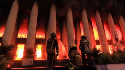 Firefighters hose blaze at Manila Post Office Building