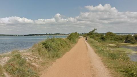 The Hayling Island Billy Trail dirt track with water on both sides