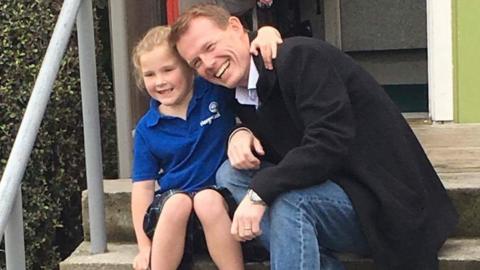 Kevin with Isla, the young girl he is raising $100,000 for