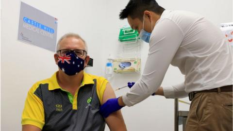 Australian Prime Minister Scott Morrison receives a Covid-19 vaccination