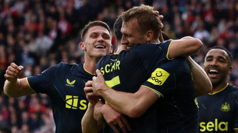 Newcastle's Dan Burn celebrates after scoring v Sheffield United in the Premier League