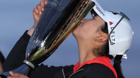 Rose Zhang kisses trophy after winning Mizuho Americas Cup