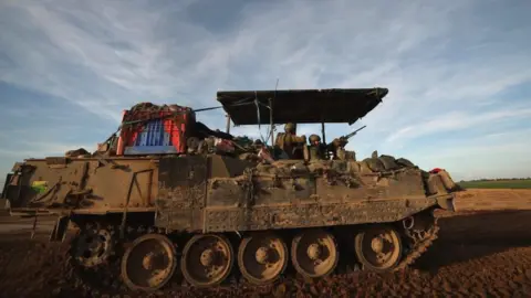 Israeli tanks patrolling along the Israeli border with Khan Younis in the southern part of the Gaza Strip, 07 March 2024.
