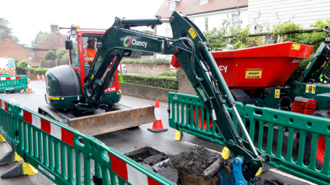 A digger installing a new water pipe in Paddock Wood