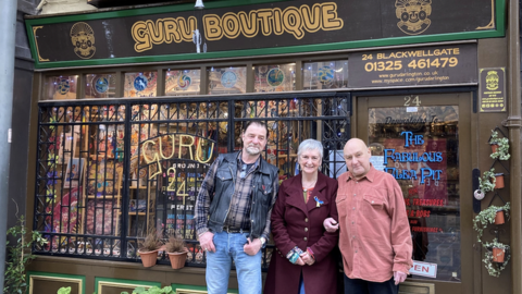 Beryl Hankin along with Colin Harrison and Tony Smith outside the Darlington shop