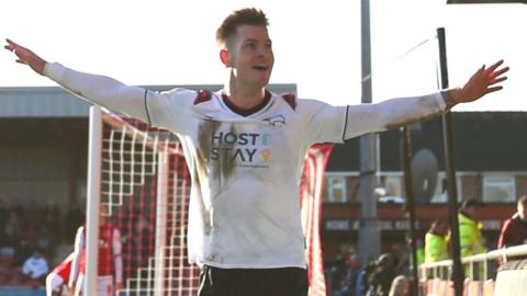 James Collins celebrates his goal for Derby at Fleetwood