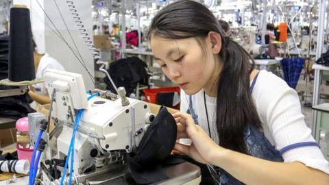 Workers at a factory in in China's eastern Fujian Province (August 2, 2018)