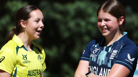 Grace Scrivens chats to a fellow player at the U19s World Cup
