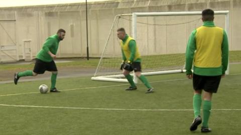 Prisoners playing football