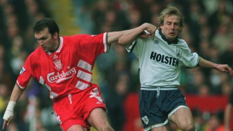 Neil Ruddock of Liverpool holds off Juergen Klinsmann of Spurs