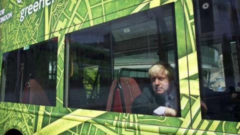Boris Johnson on a green bus
