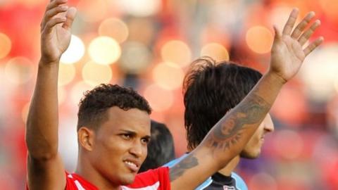 Panama's Amilcar Henriquez celebrates after winning the penalty shoot-out against El Salvador during their UNCAF Central American Cup soccer match in Panama City
