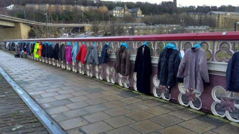 The coats hanging on the bridge