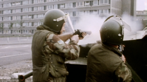 Soldier firing plastic or rubber bullets