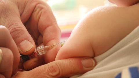 Vaccine and syringe - file pic