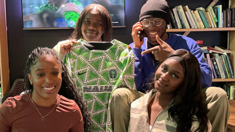 Students with a Nigeria shirt