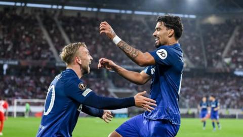 Lucas Paqueta and Jarrod Bowen celebrate after West Ham score at Freiburg