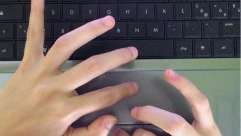 Generic hands on laptop