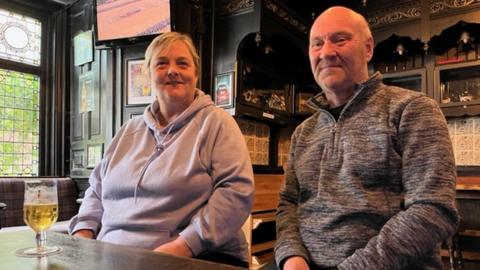 Marise and Vernon Myers were among those watching the funeral at Ye Olde White Harte