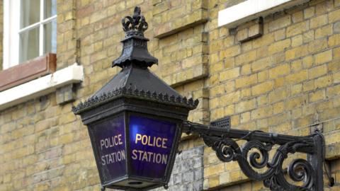 A blue lamp outside the Metropolitan Police Service polic