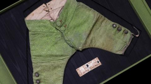 A pair of green silk brocaded trousers thought to have been worn by the 17th century court dwarf Sir Jeffrey Hudson sold for £9,570 at auction
