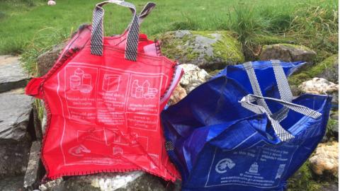 Two of the new Pembrokeshire recycling bags