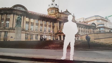 Hassan's photo outside the council house