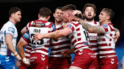 Wigan celebrate a try