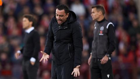 Barcelona boss Xavi shouts in frustration on the touchline