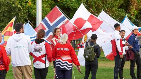 Flags at the closing ceremony of the 2023 Island Games
